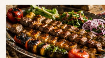 Persian grilled kebab with tomato and herbs